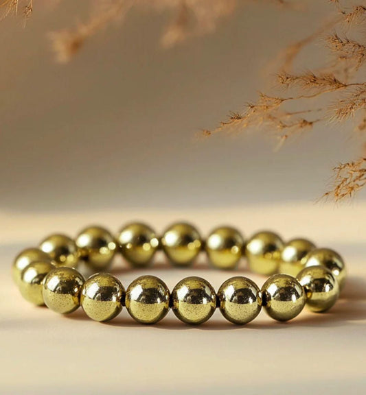 Pure 24 Caret Gold Crystal Tiger eye Bracelet.